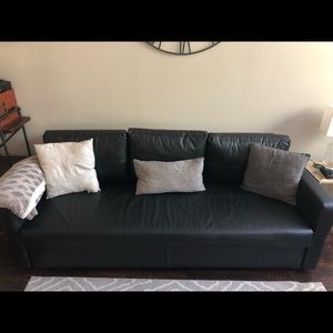 Black queen size pull out sofa with storage